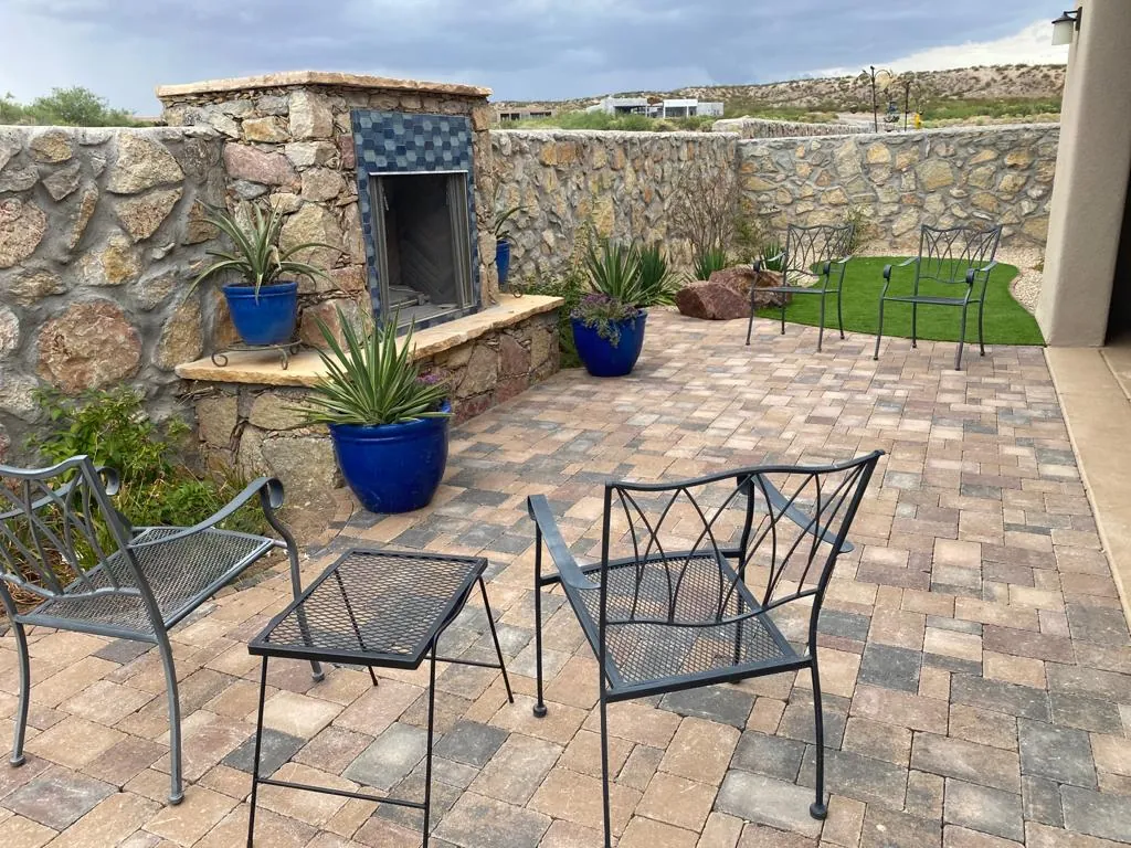 Garden Center of Las Cruces outdoor living patio with stone fireplace, paver patio, and seating in Las Cruces, NM Garden Center of Las Cruces outdoor living patio with stone fireplace, paver patio, and seating in Las Cruces, NM